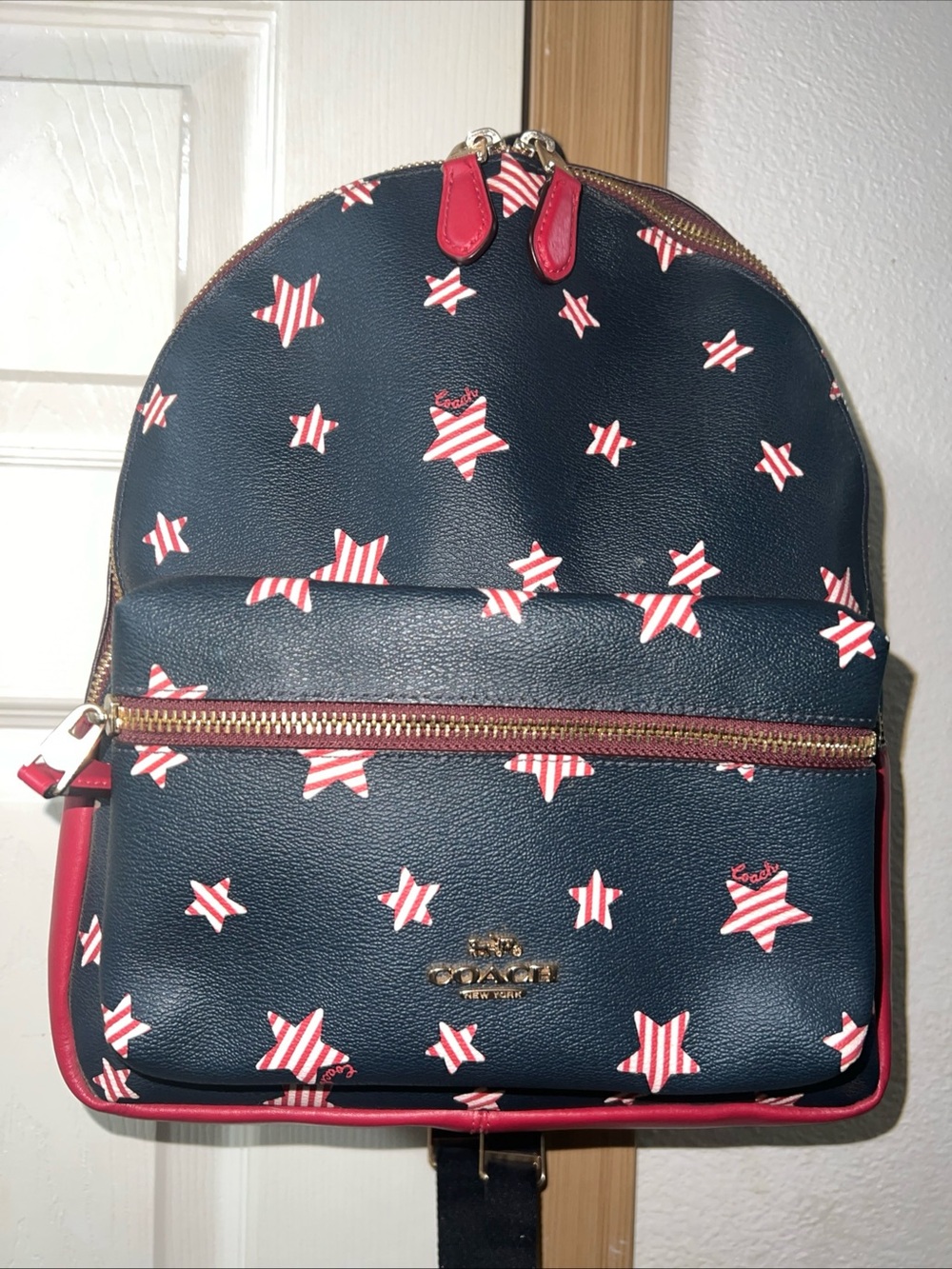 Coach Charlie Americana Navy Mini Backpack with Red and White Star Print